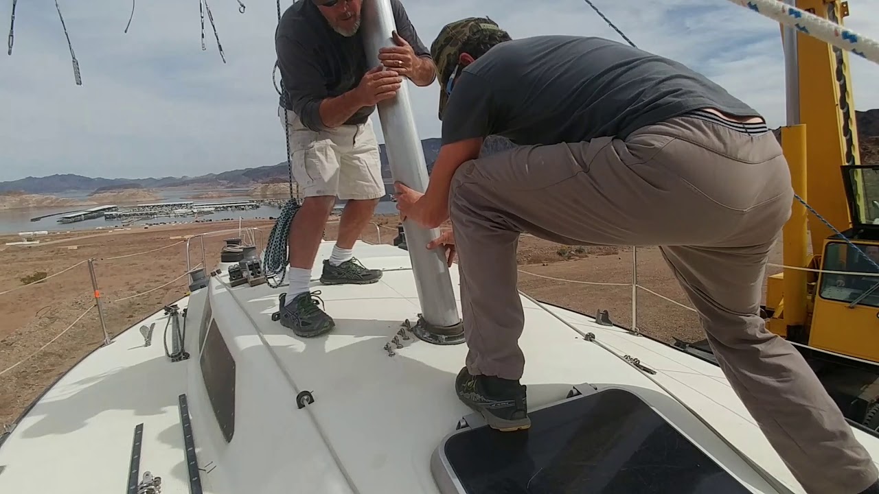Raising The Mast of a Sovorel 33 Sailboat