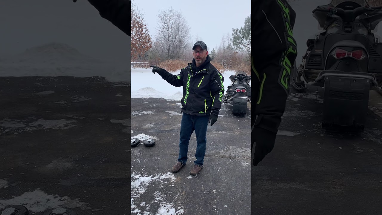 Loading a snowmobile with wheels that attach to the ski. Terick Soulutions EZ Wheelz comparison.