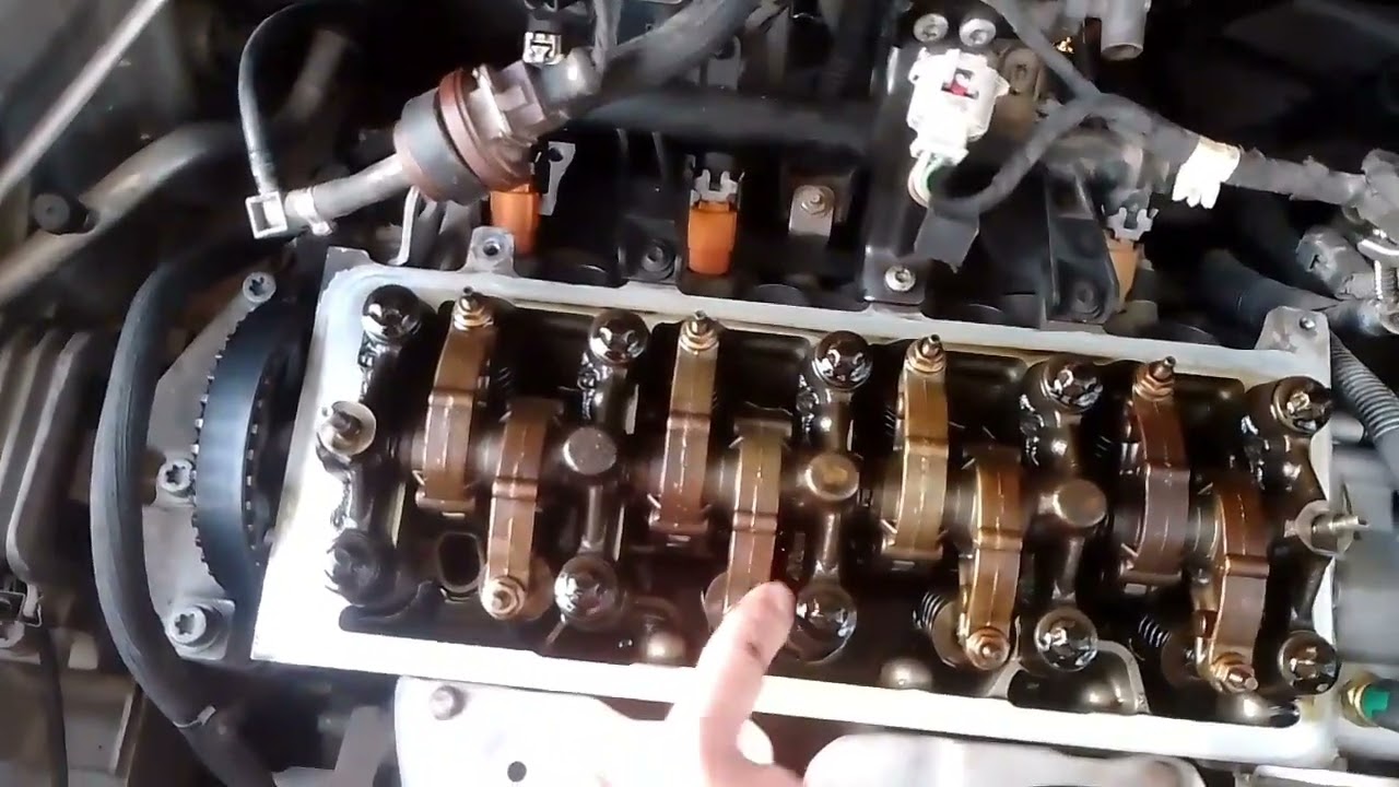 طريقه ضبط رؤوس الصمامات بيجو 207 .206.c3 . Comment régler les doigts culbutaires Peugeot 207