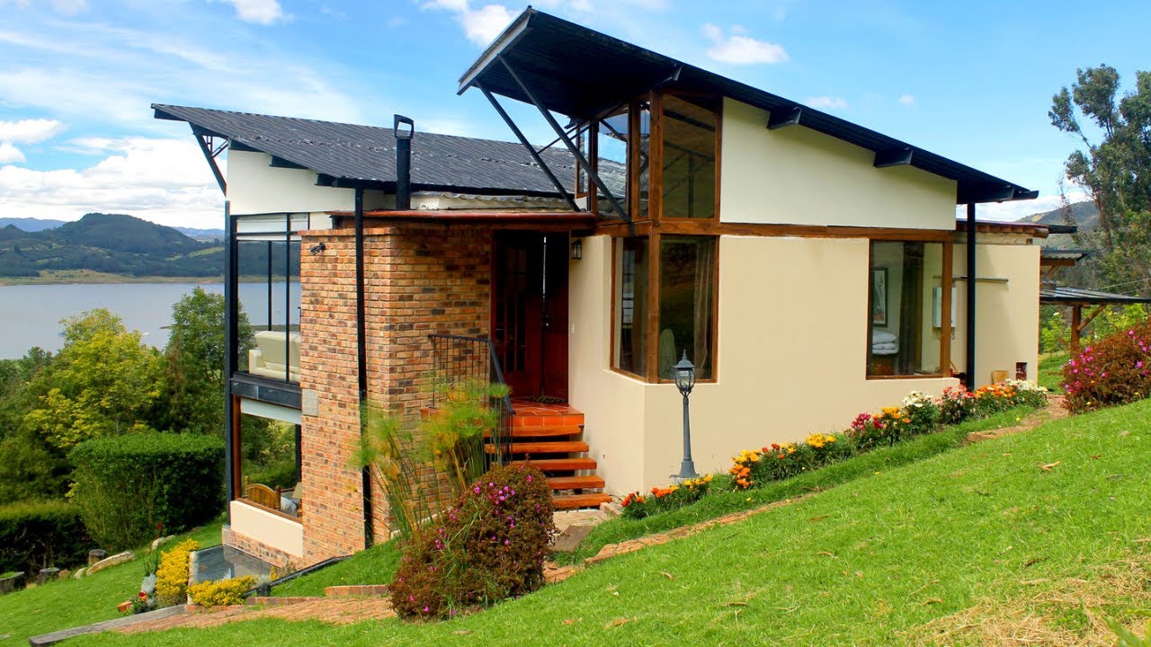 65 CASAS EM TERRENOS DECLIVE e ACLIVE