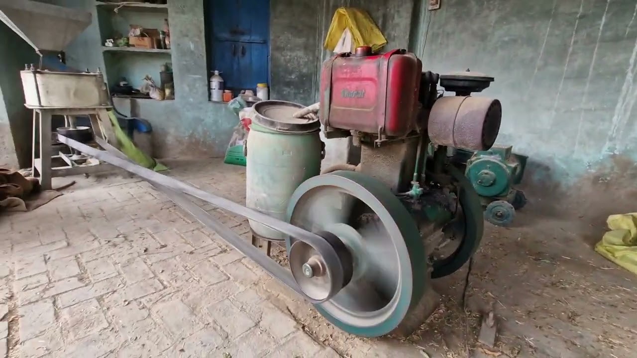 Old fashioned atta chakki in working condition being used for cattle feed