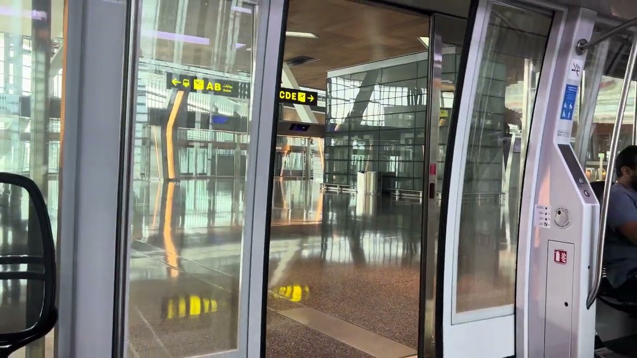 Take free train between gate C and A at Doha airport, Qatar