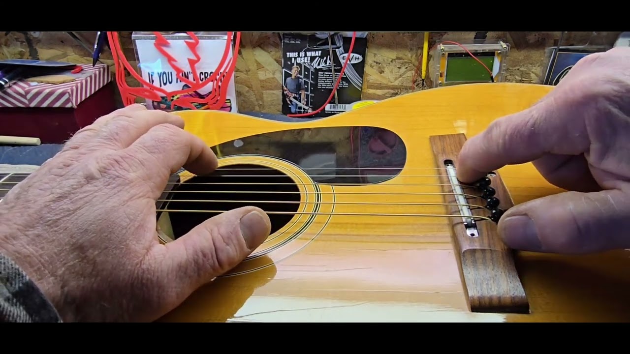Guitar repair. Slotting bridge pin holes on an old epiphone acoustic with bolt on neck . sound demo