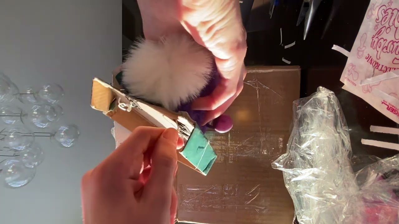 Unboxing a very purple furby baby