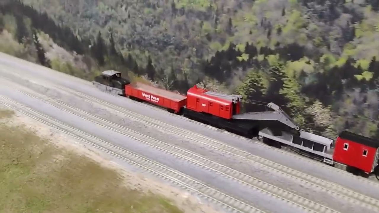 Steeple Cab pulling West Penn work train.
