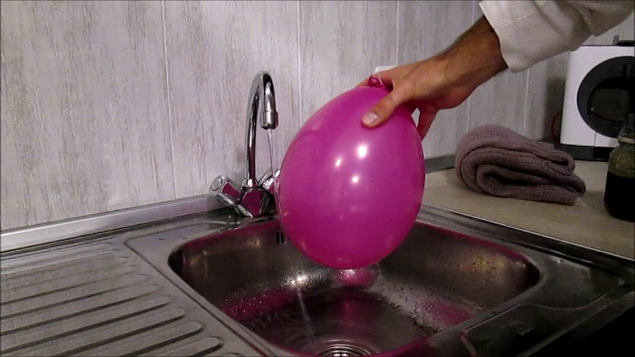 Balloon Science - Bending Water With a Balloon - Amazing Trick