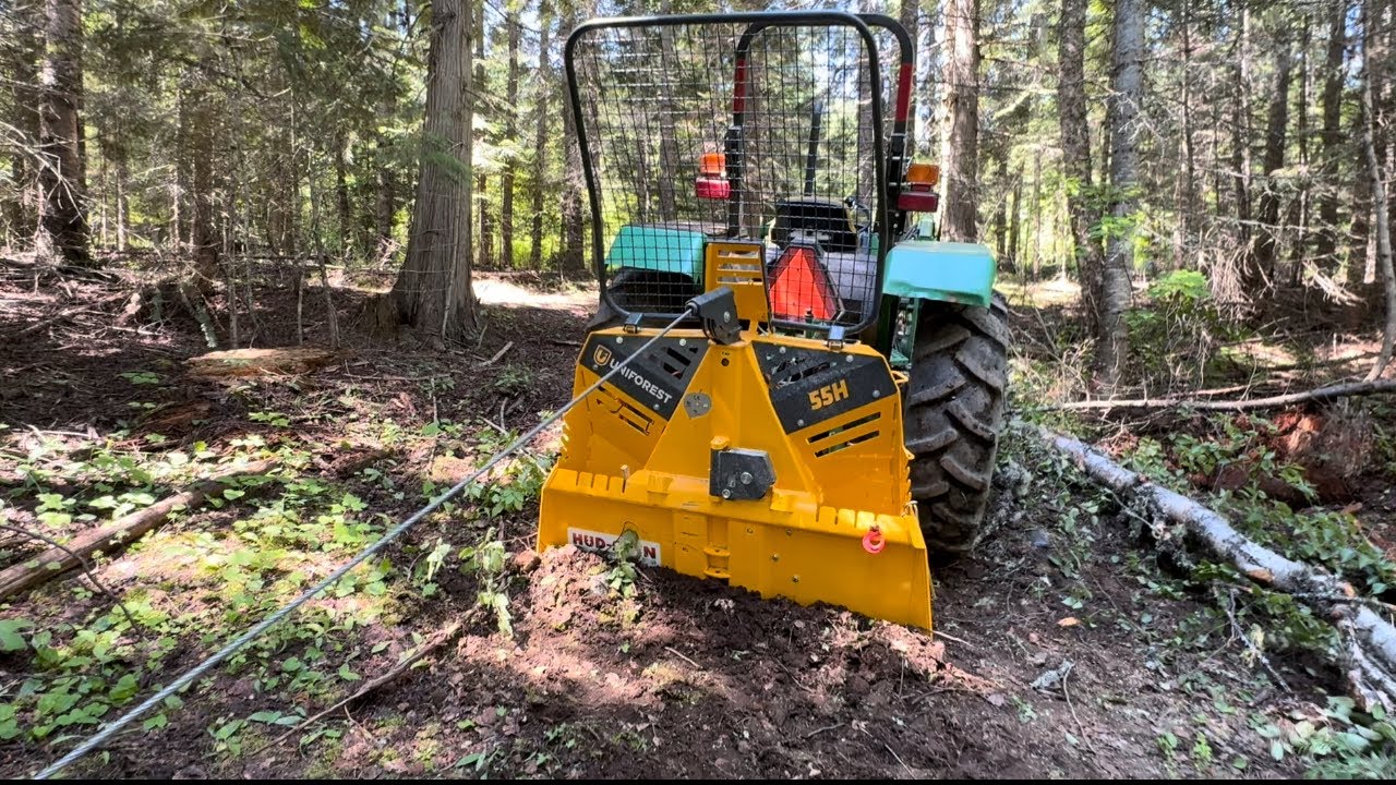 Uniforest 55H skidding winch skidding Red Fir logs