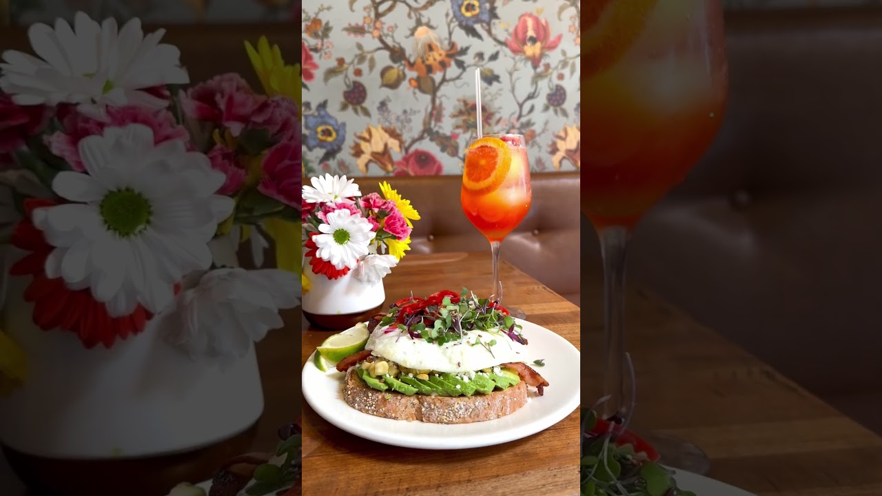 Delicious Brunch avocado toast and an Aperol Spritz