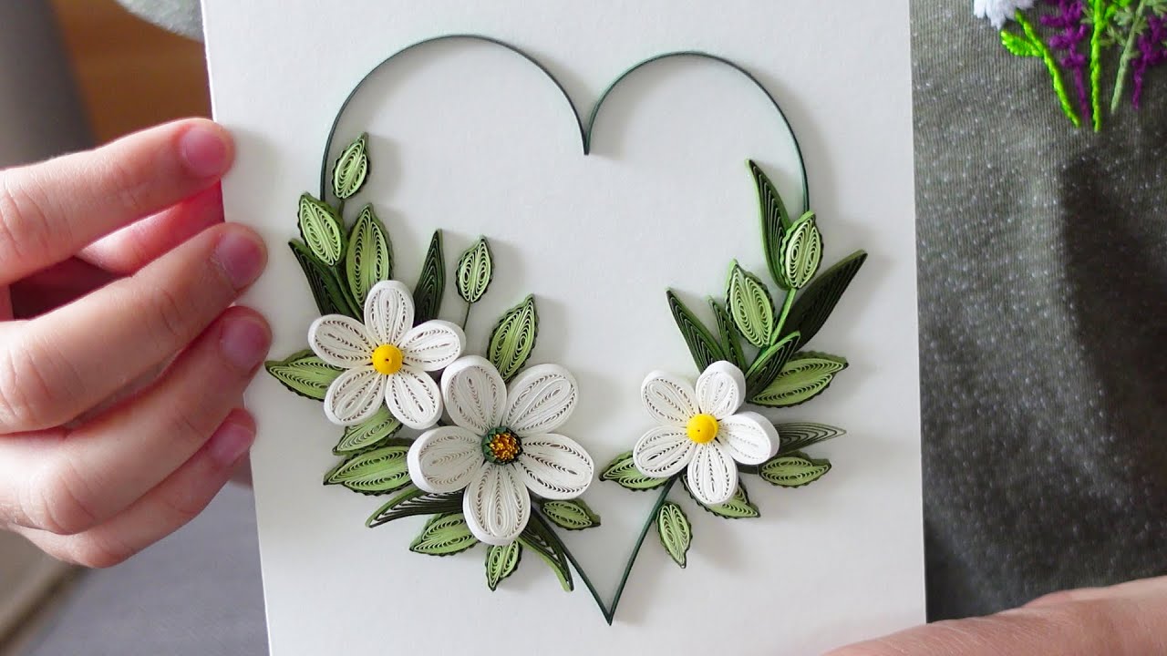 Making a heart from paper quilling 💚