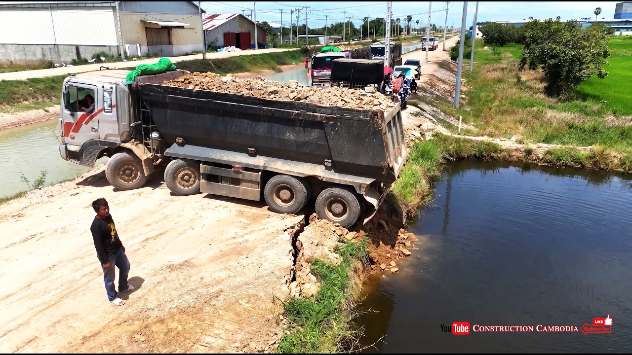 Nicely Land Reclamation In Flood Land! Dump Truck Unloading Soil and Bulldozer Spreads and Pushes