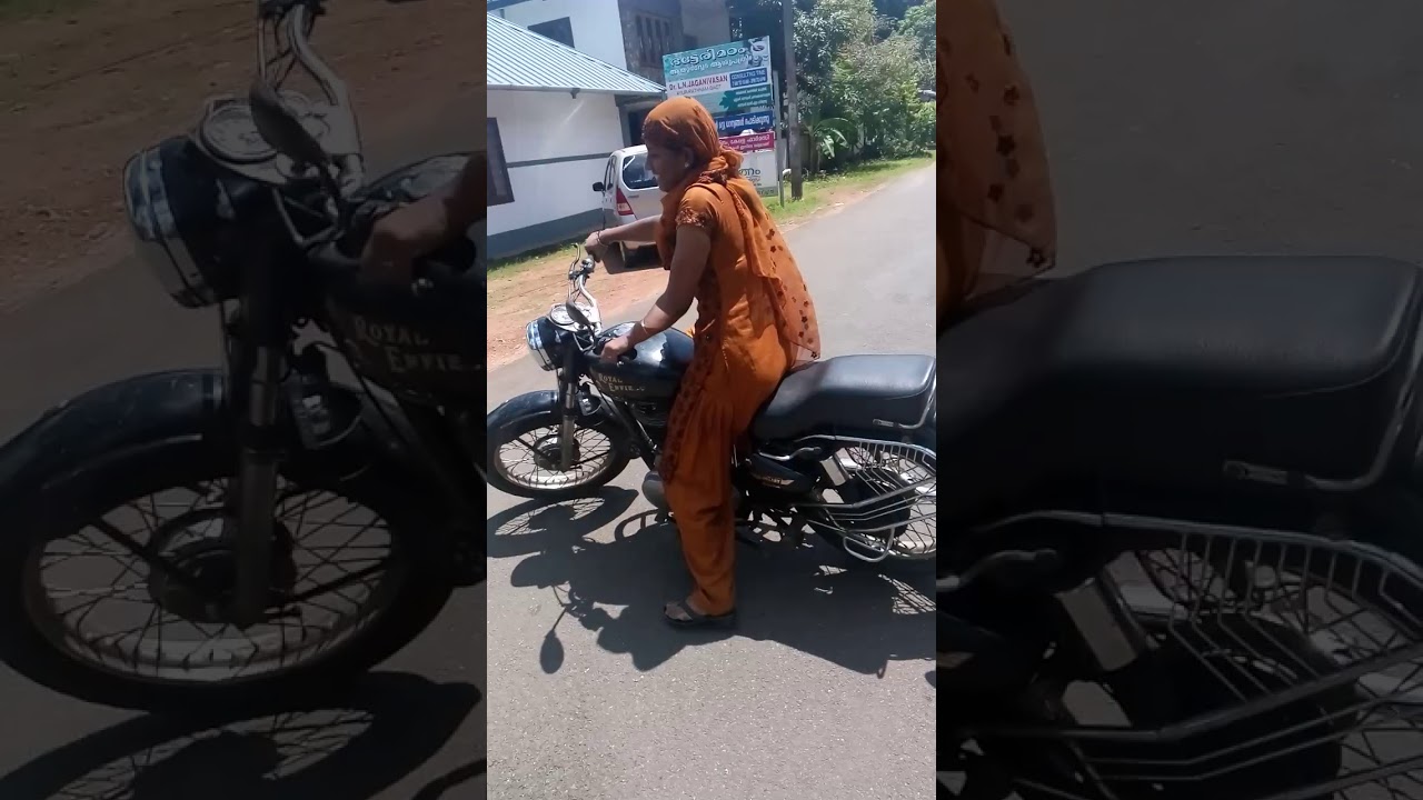 Little girl amazing ride in old royal Enfield