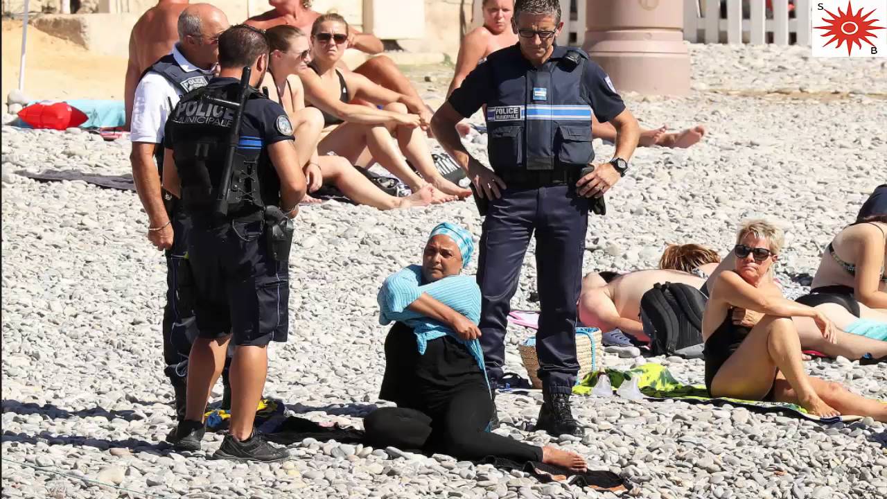 Forcefully French Police Make Woman Remove Burkani On Nice Beach