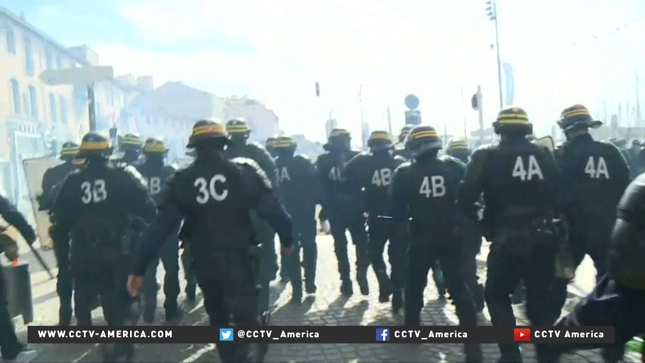 EuroCup soccer fans clash with riot police in Marseille