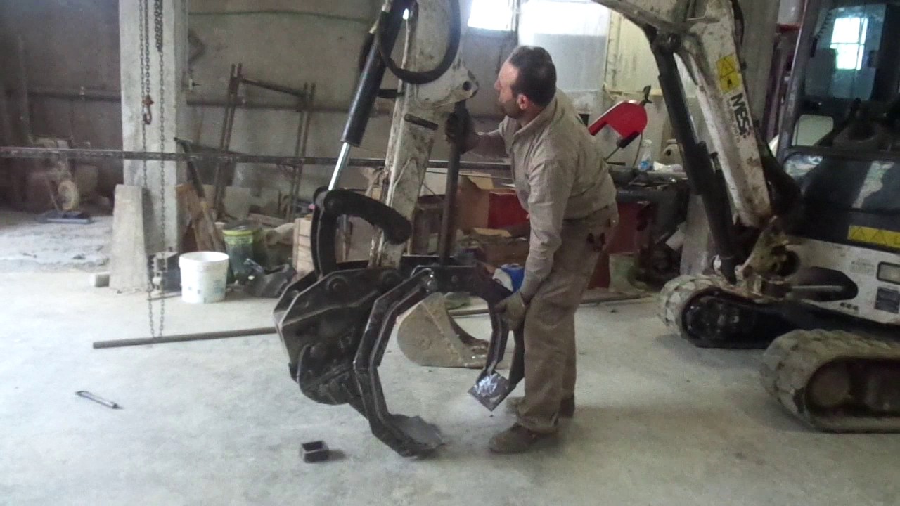 homemade grapple excavator  pinza legna autocostruita, attacchi rapidi, autoserrante per bobcat 428