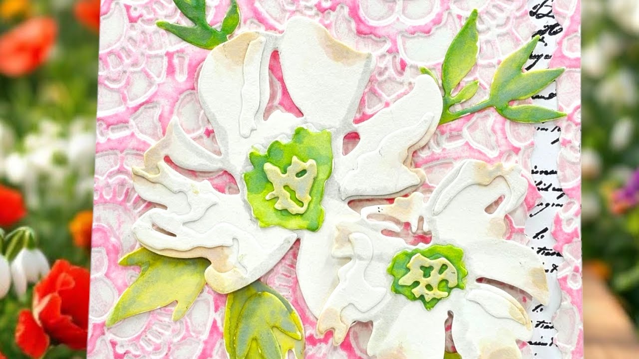 Let's create a spring card using some Sizzix and Tim Holtz products.