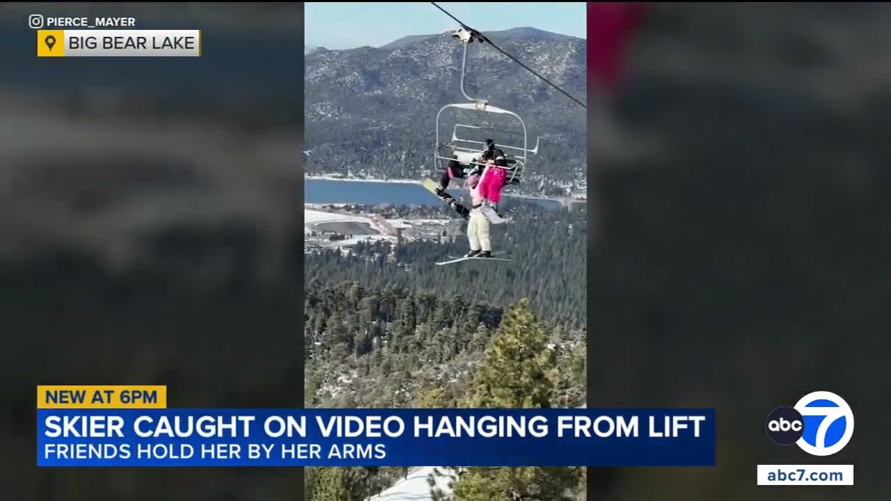 Frightening! Skier dangles from ski lift in Big Bear as 2 others hold her arms