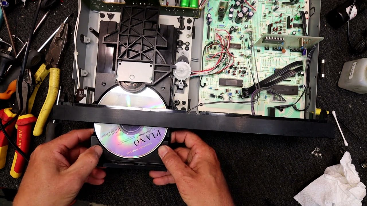 CD Player Repair Part 3. Servicing and replacing the tray loading belt in a Sansui CD-X301i