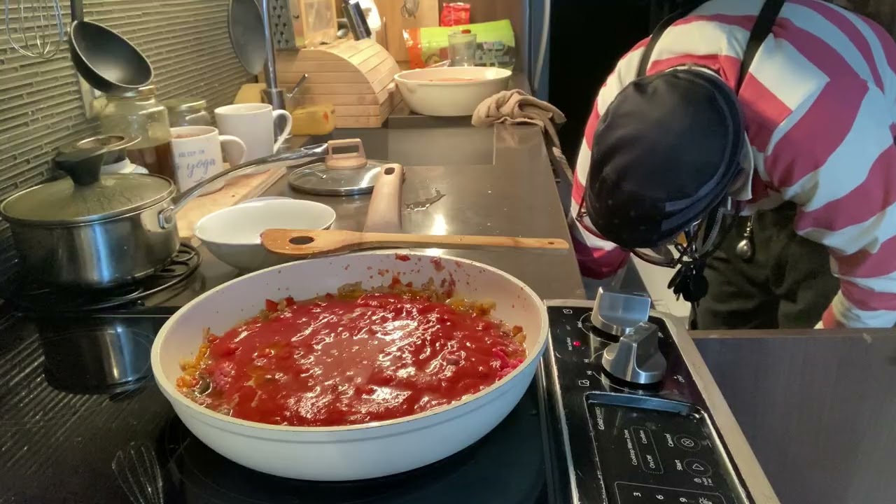 Adding spaghetti sauce for meat sauce, studio break