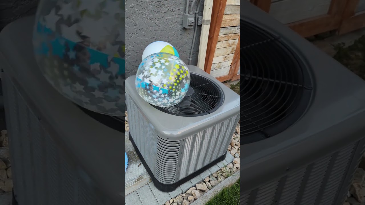 What happens when we put beach balls on an air conditioner? #scienceexperiment #beachballs