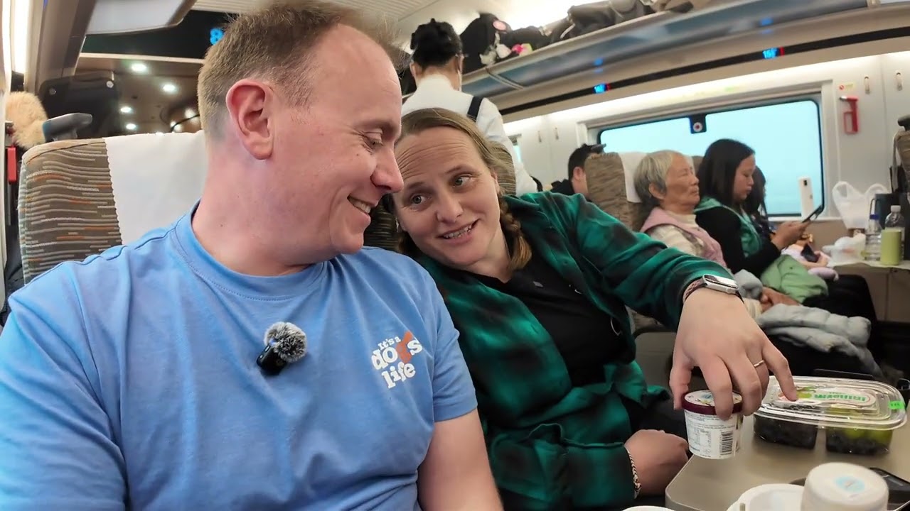 A normal ish couple from the UK now travelling Shanghai to Beijing by Bullet Adam & Nicola 