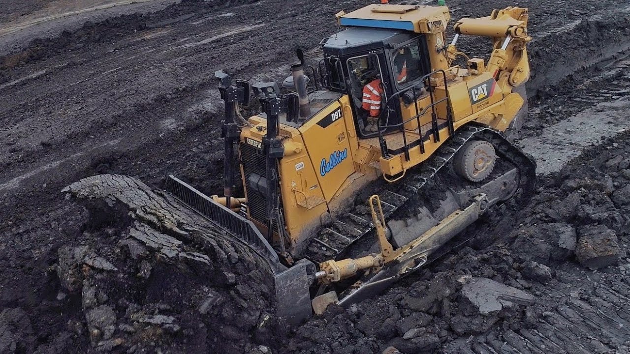 Cat D9T Dozer Bulk Pushing Downhill