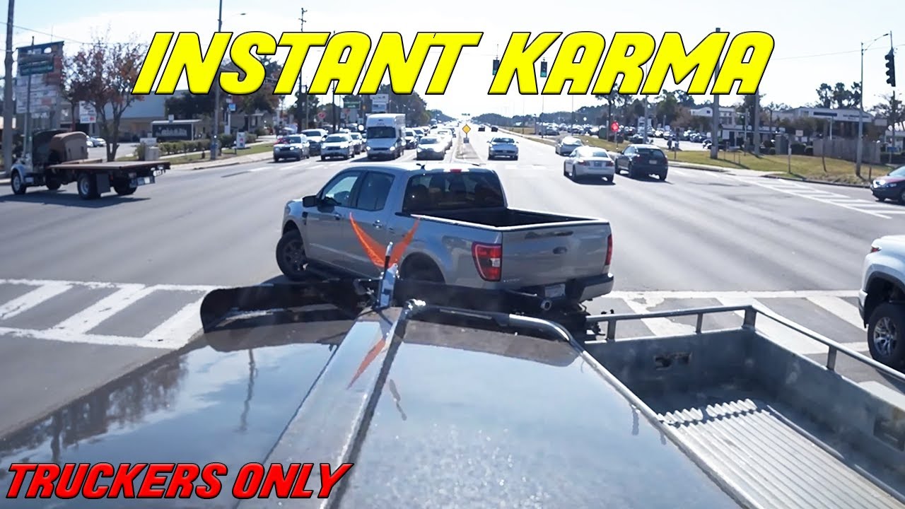 IDIOT CUTS TRUCKER OFF AND GETS A SPECIAL PRIZE