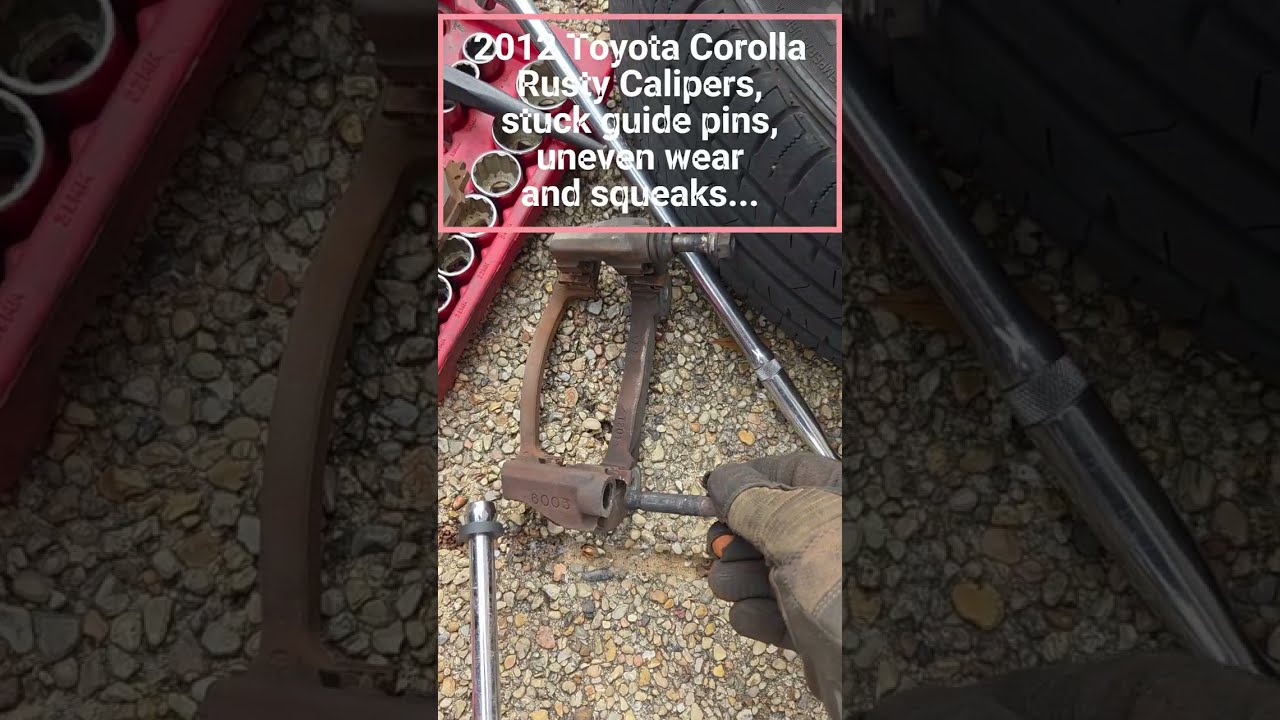 2012 Toyota Corolla  Rusty calipers and stuck guide pins and unevenly worn break pads, 
