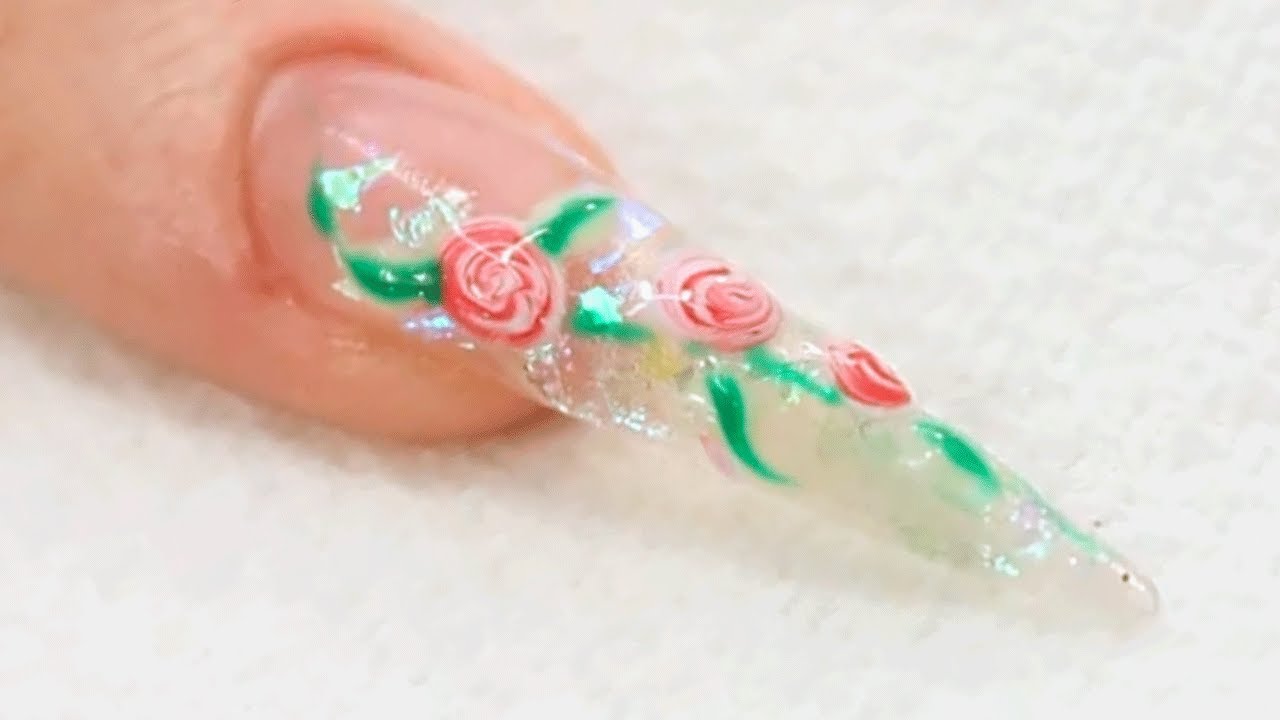 Видеоурок по созданию дизайна ногтей с помощью УФ-геля в виде роз от Naio Nails