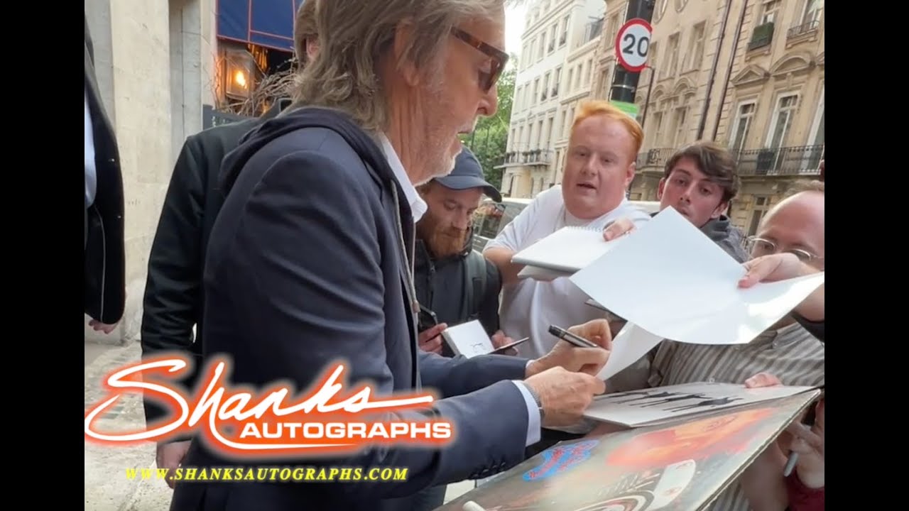 Legendary Sir Paul Mccartney Is Cool and in good spirit signing Autographs at Ivor Novello Award