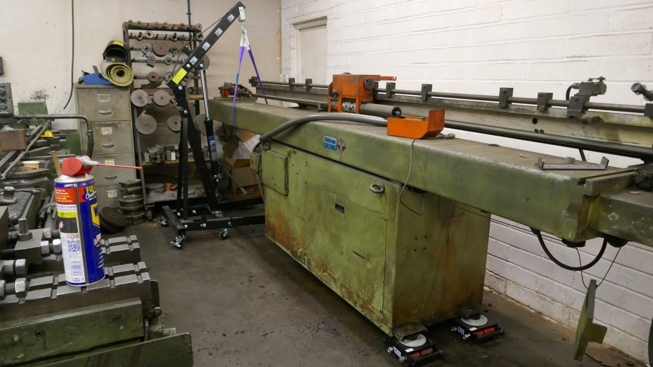Moving machinery with an Engine Hoist or Floor Crane.
