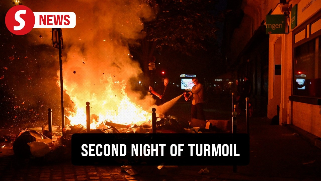 Fires burn in Paris streets as chaotic protests continue for second consecutive night