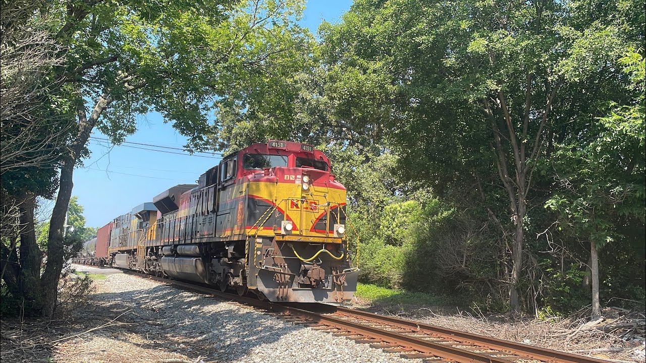 CSX with a KCS SD70ACE leading a very long ethanol train through mineral springs