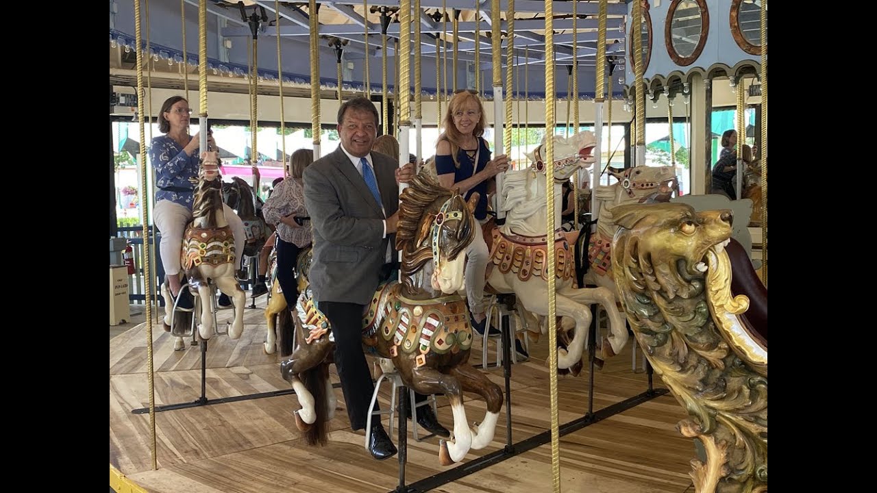 Westchester County Executive George Latimer & his wife Robin enjoy the Grand Carousel at Playland