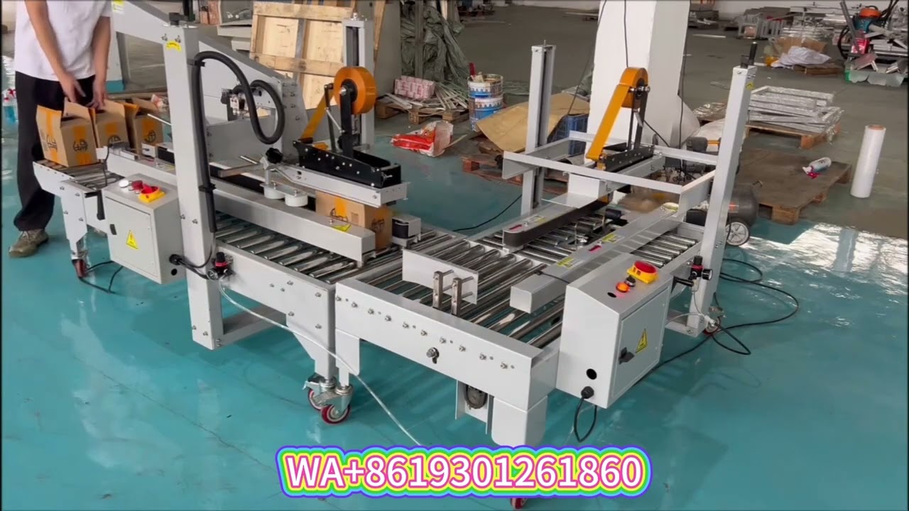 Cross carton sealing machine#machine #cartonsealingmachine #carton sealing