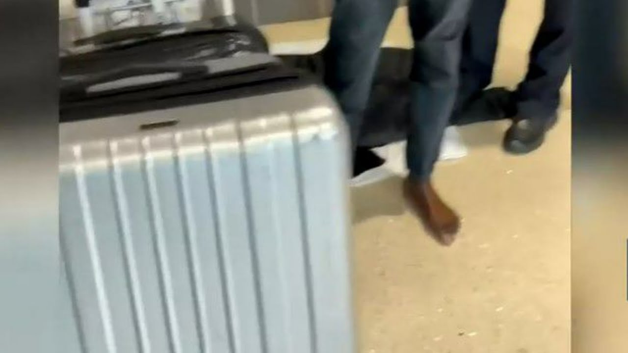 Man tracks stolen luggage at Atlanta's airport, finds man wearing his clothes