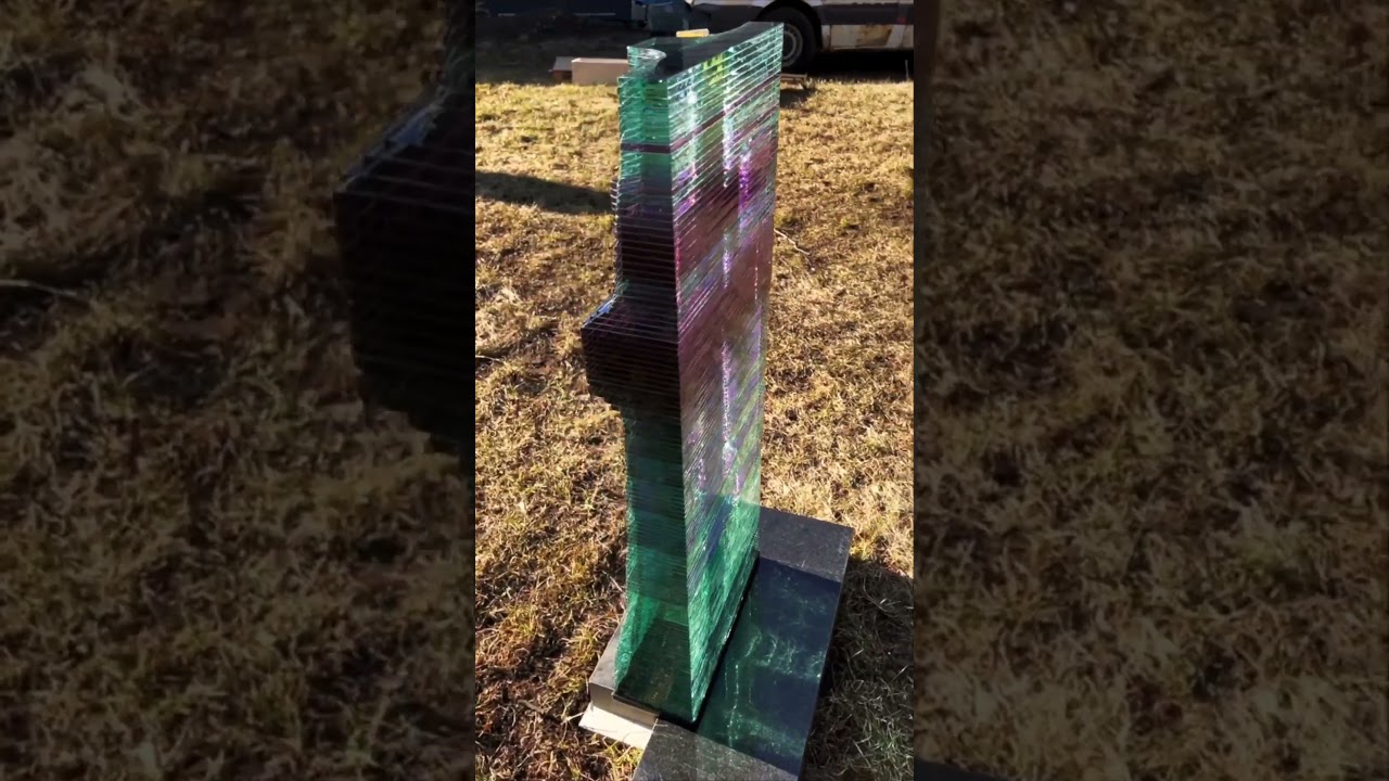Exclusive, color-changing headstone in the shape of a cross 