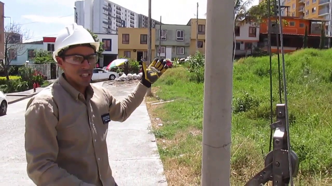 Observa como es la Templa de Retenida en cable de acero para red eléctrica (Video Clase Linielec)