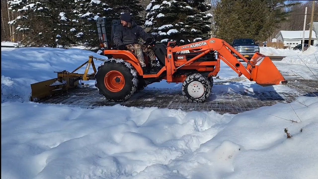 Plowing Snow With A Compact Kubota Tractor
