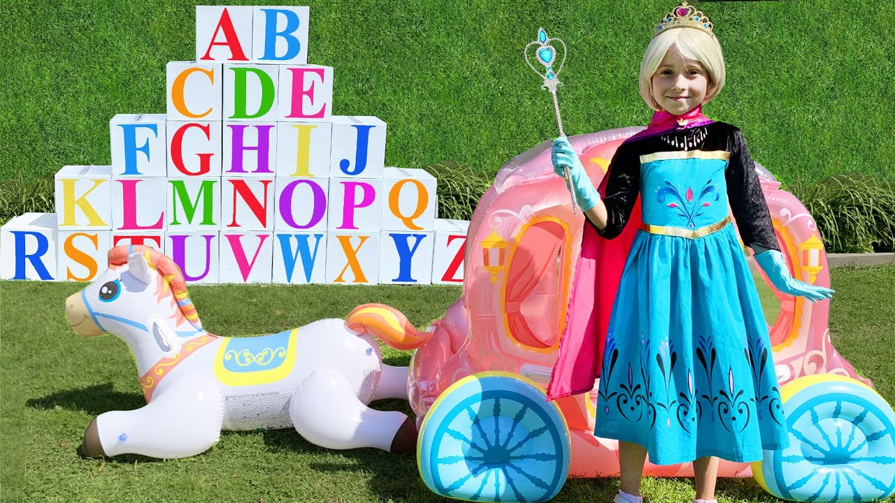 Sofia and Papa open magic boxes with the English alphabet