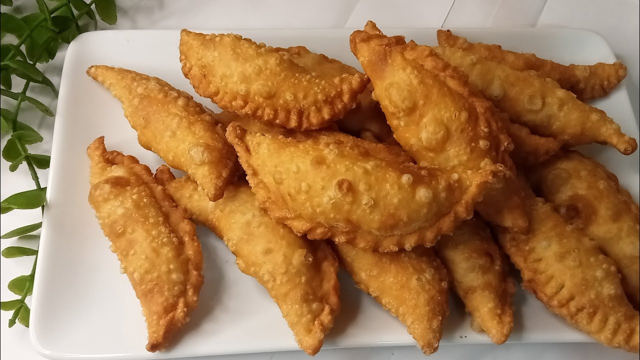 নারিকেলের ভাজা পুলি পিঠা রেসিপি।।vaja Puli pitha//Bengali pitha Recipe. 