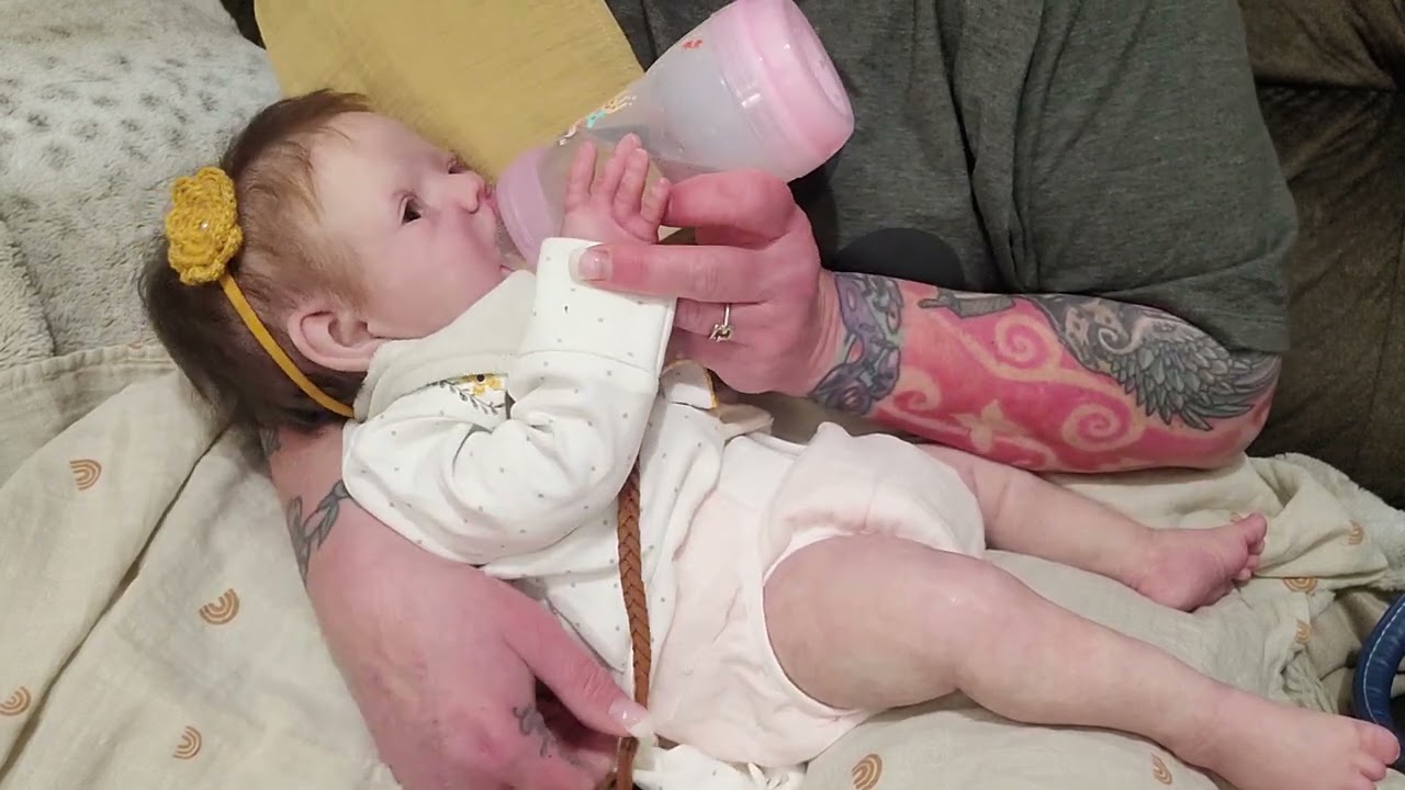 Silicone baby drinks & wets in a cloth diaper!