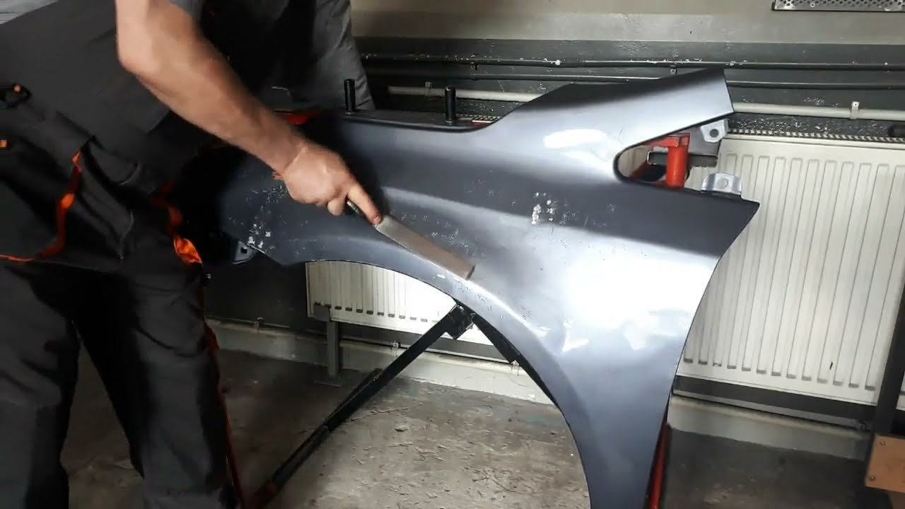 Prostowanie błotnika klepadłem