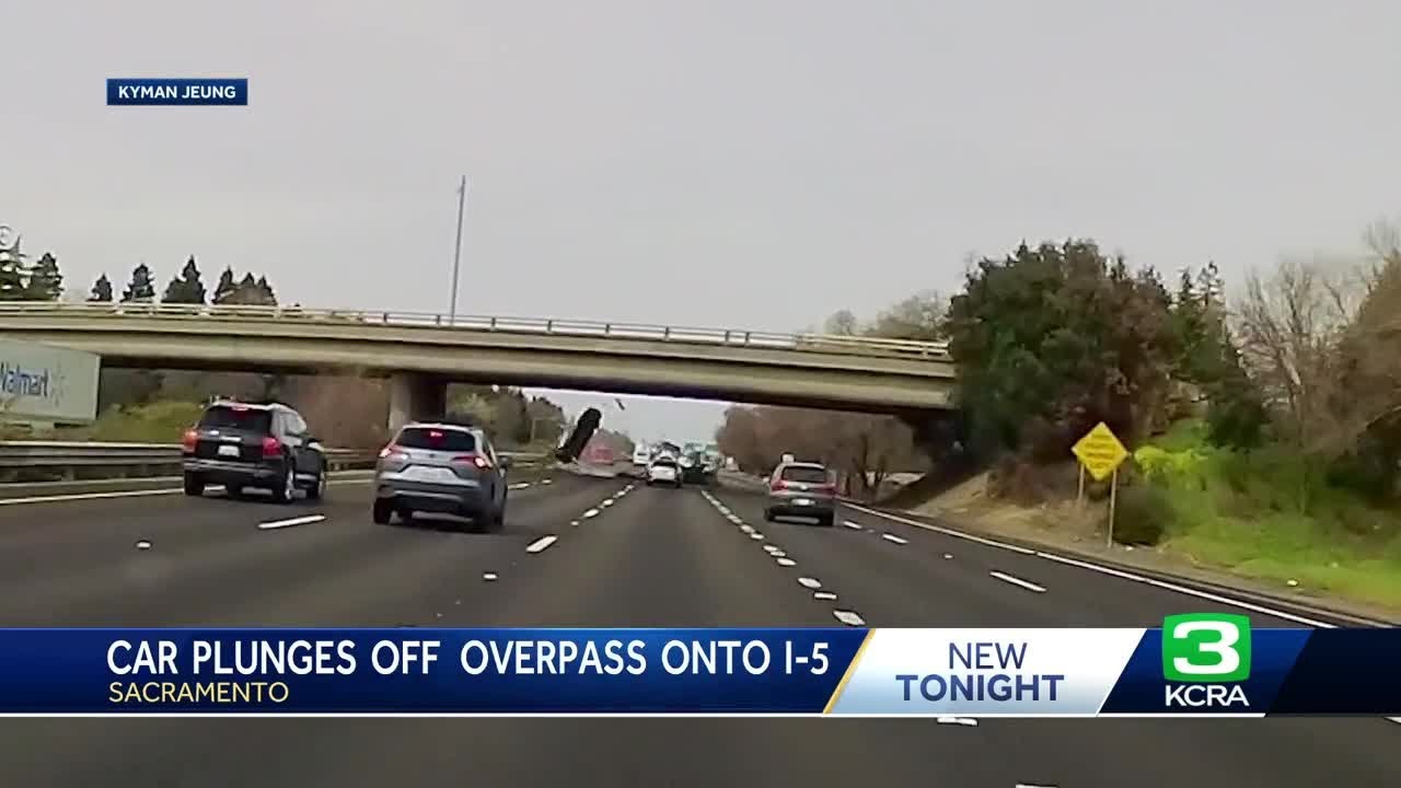 Dash cam video shows vehicle fly off I-5 overpass in Sacramento