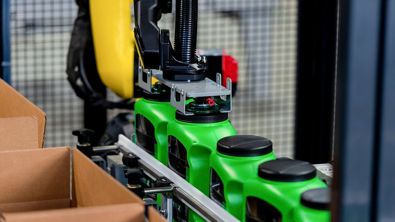 Robotic Case Packer - Jugs of Grass Seed