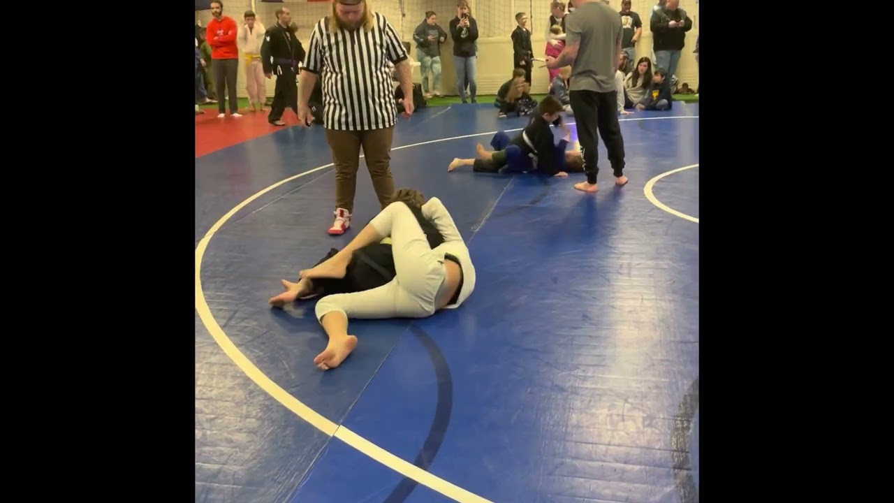 Teen girl and Boy yellow belt BJJ