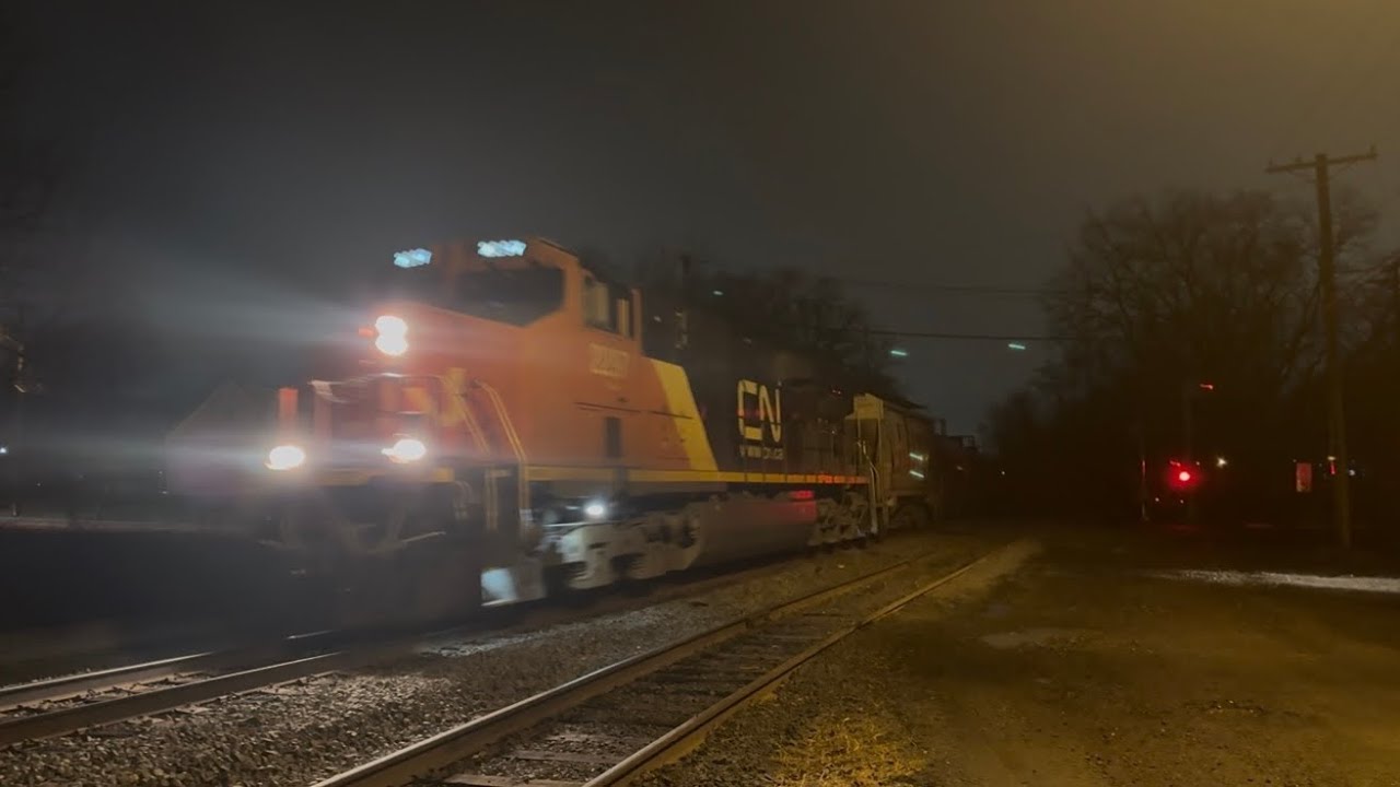 CN 2297 ES44AC leads CSX B705 at Piscataway with a  CN ES44AC DPU 