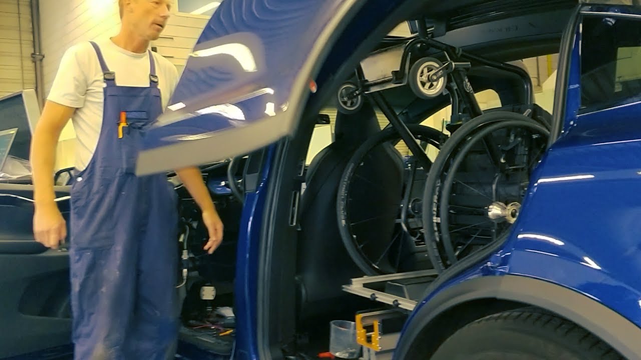 #21. Wheelchair in a Tesla Model X