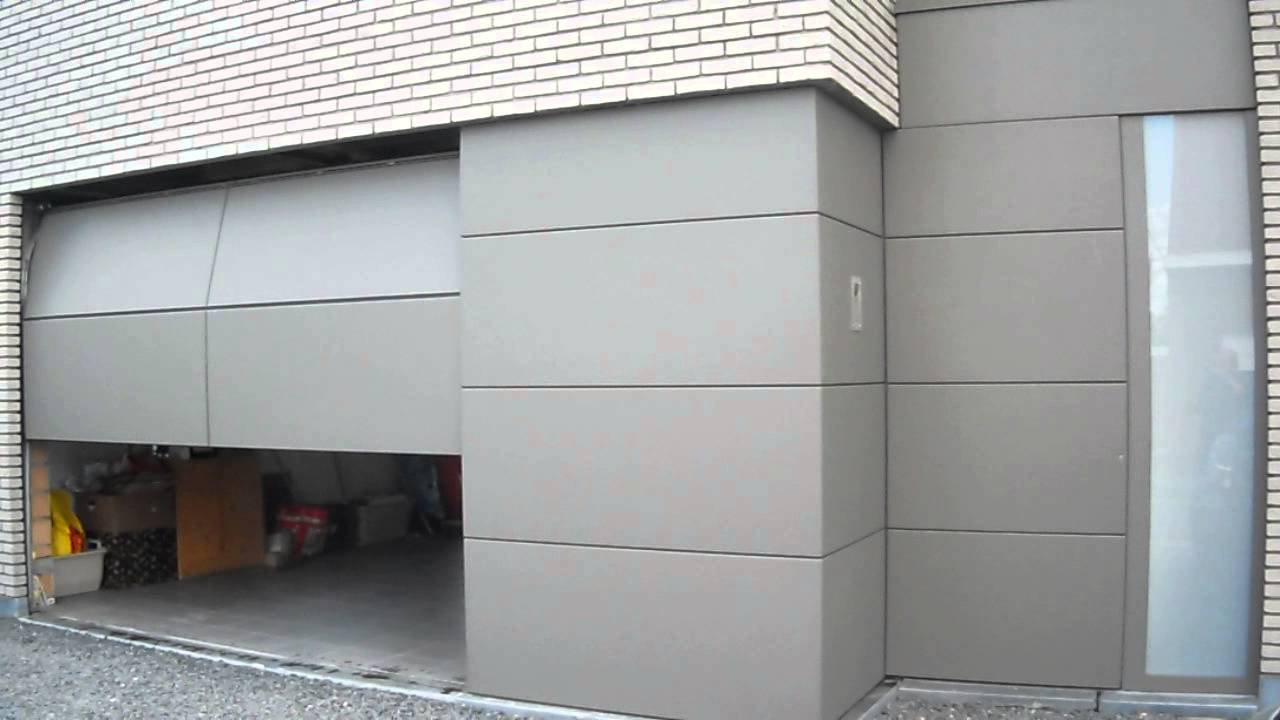 Szctionaal poort invisidoor 4 delig aluminium 3 mm montage door Votech bvba