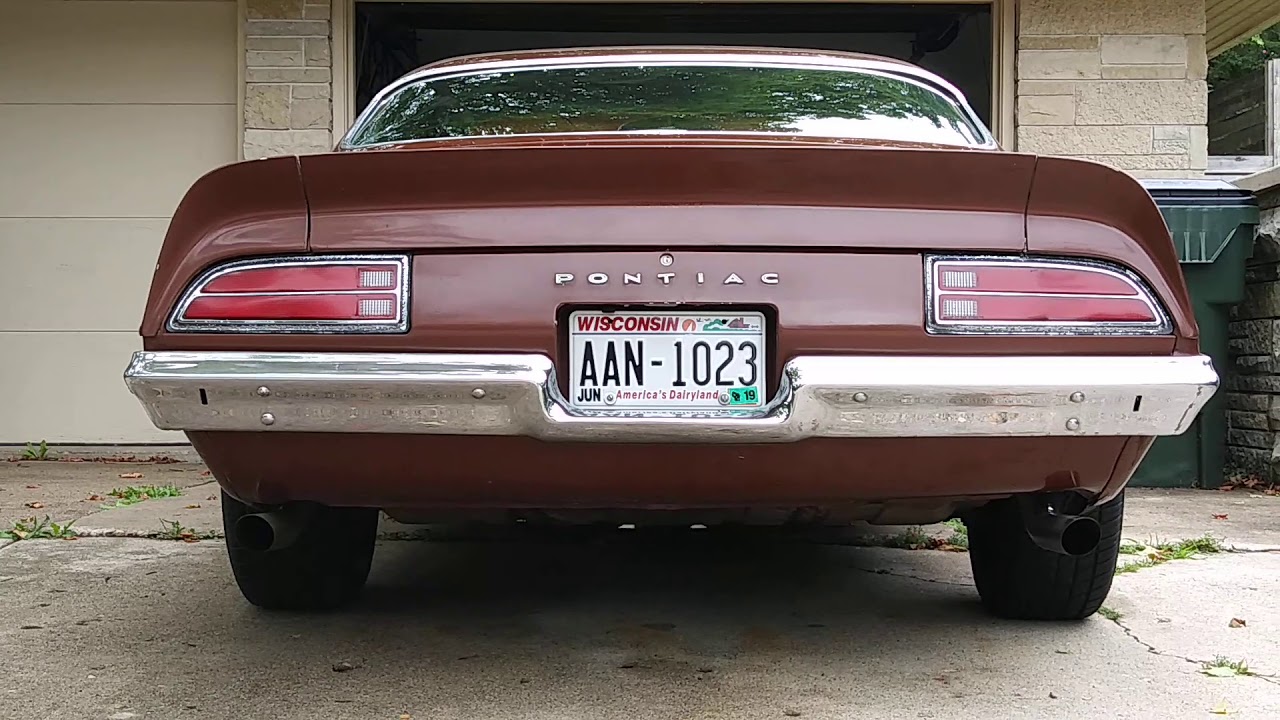 1971 Pontiac Firebird stock 350 motor with Pypes exhaust.