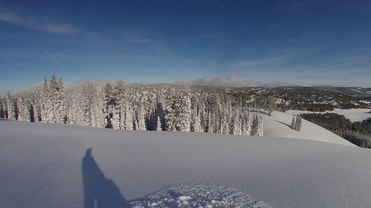 Deep Powder Bluebird Boondocking Snowmobile